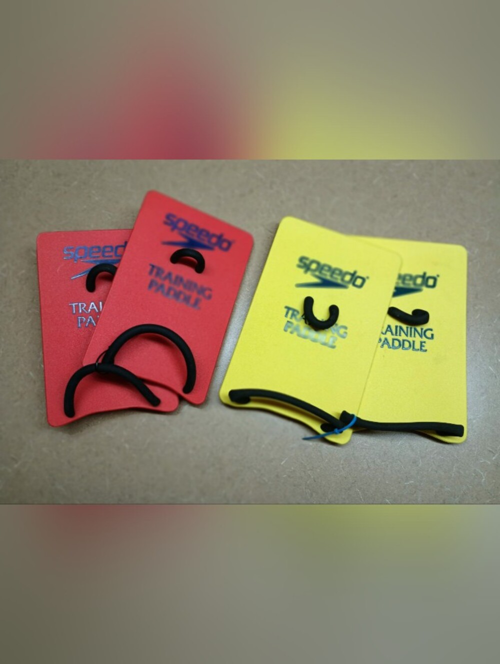 Speedo Swim Training Paddles in Red and Yellow